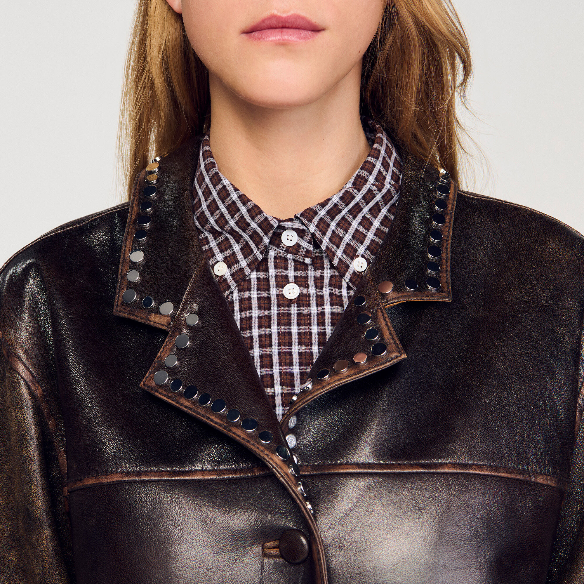 Oversized leather jacket with studs brown For Women | Sandro Paris