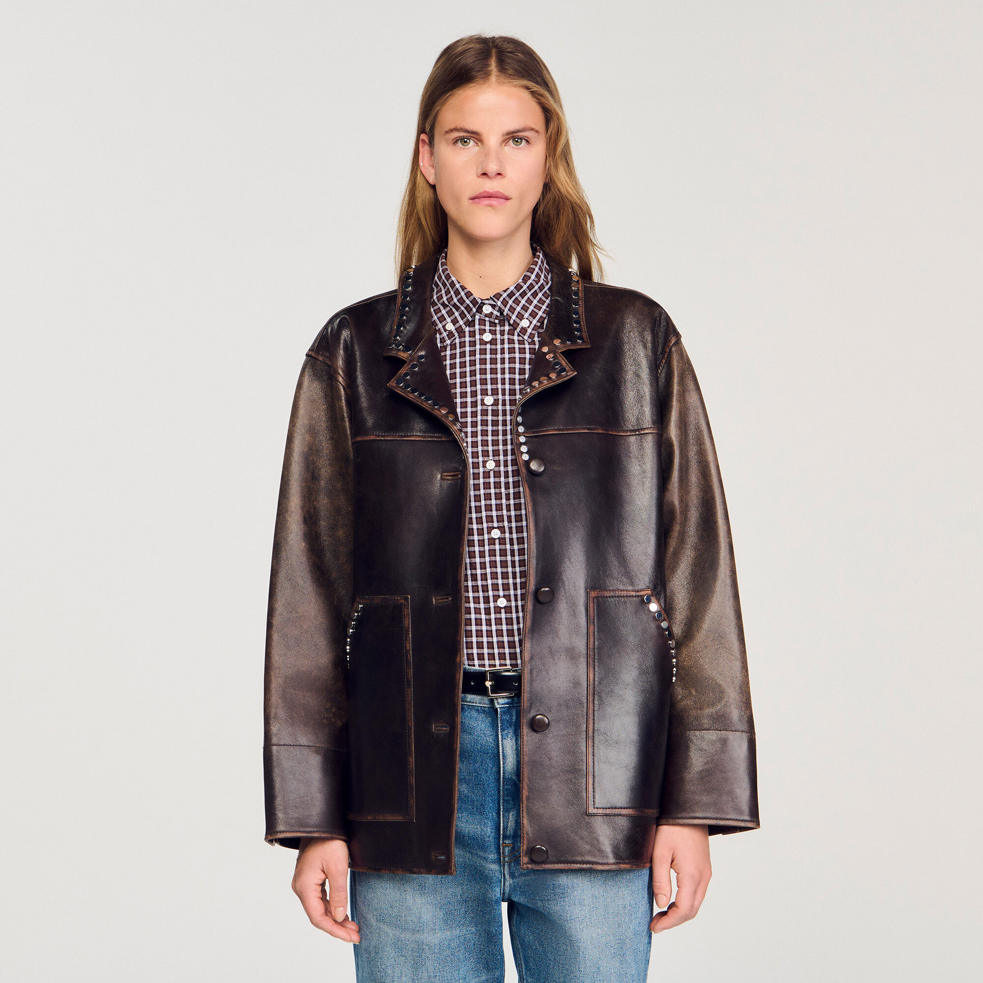 Oversized leather jacket with studs brown For Women | Sandro Paris