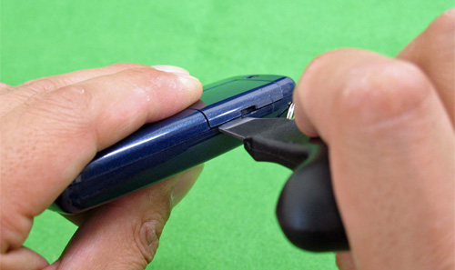 電池蓋の開け方（MODEL：HX‐06M）