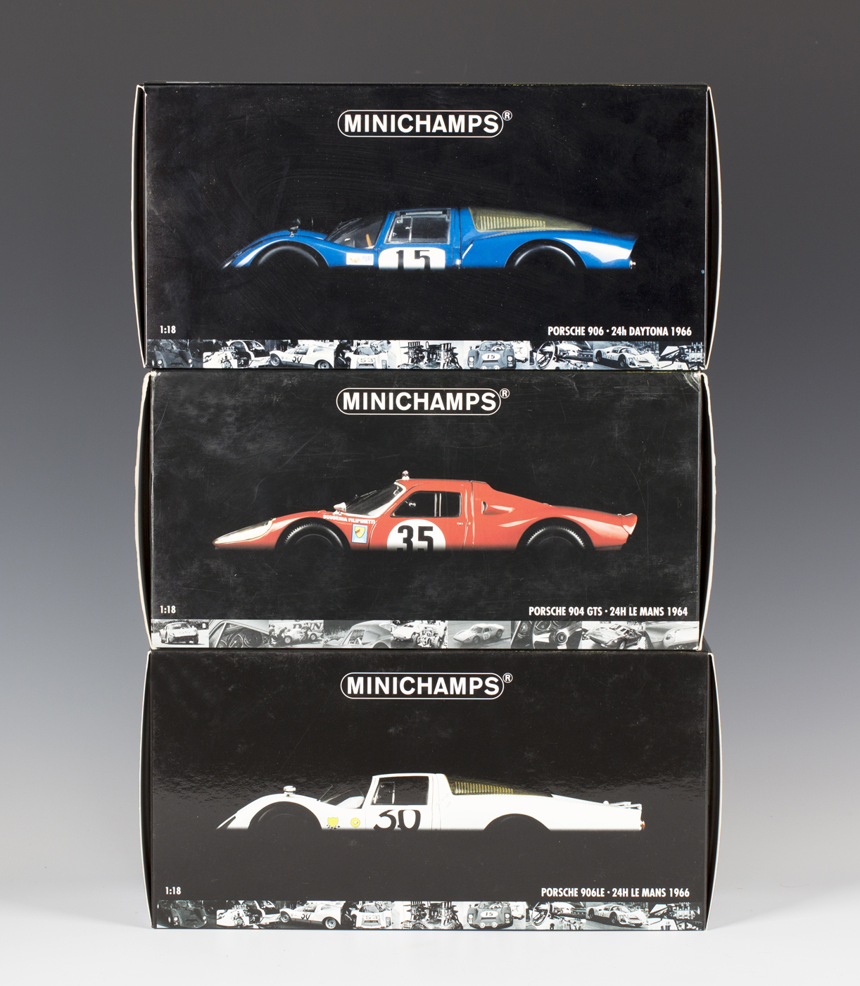 Four Minichamps 1:18th scale Porsche sports cars, comprising a