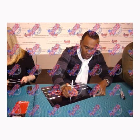 シュガー・レイ・レナードのサイン入り16×12写真対ロベルト・デュラン