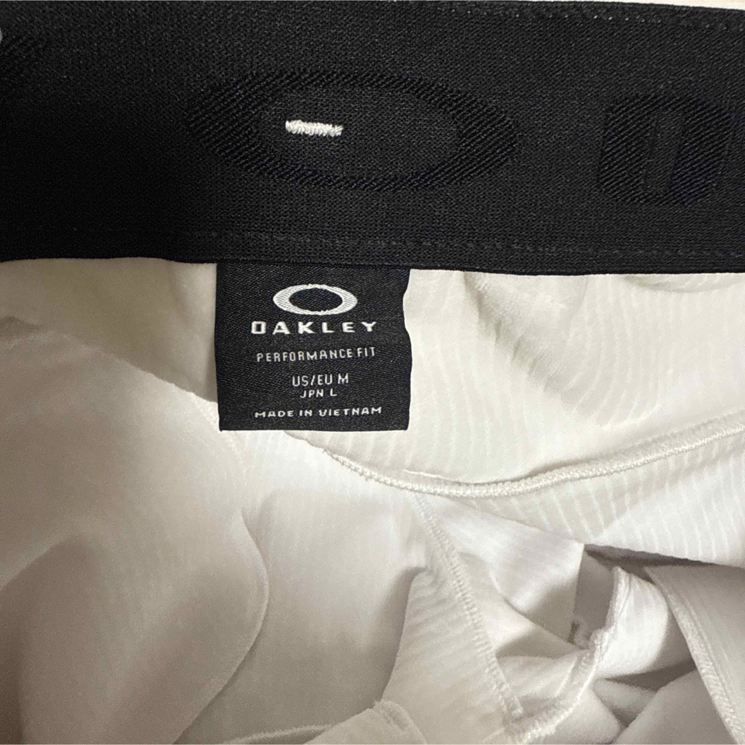 防寒対策に！OAKLEY フード付き裏地ベロア上下 ホワイト Oakley - 防寒