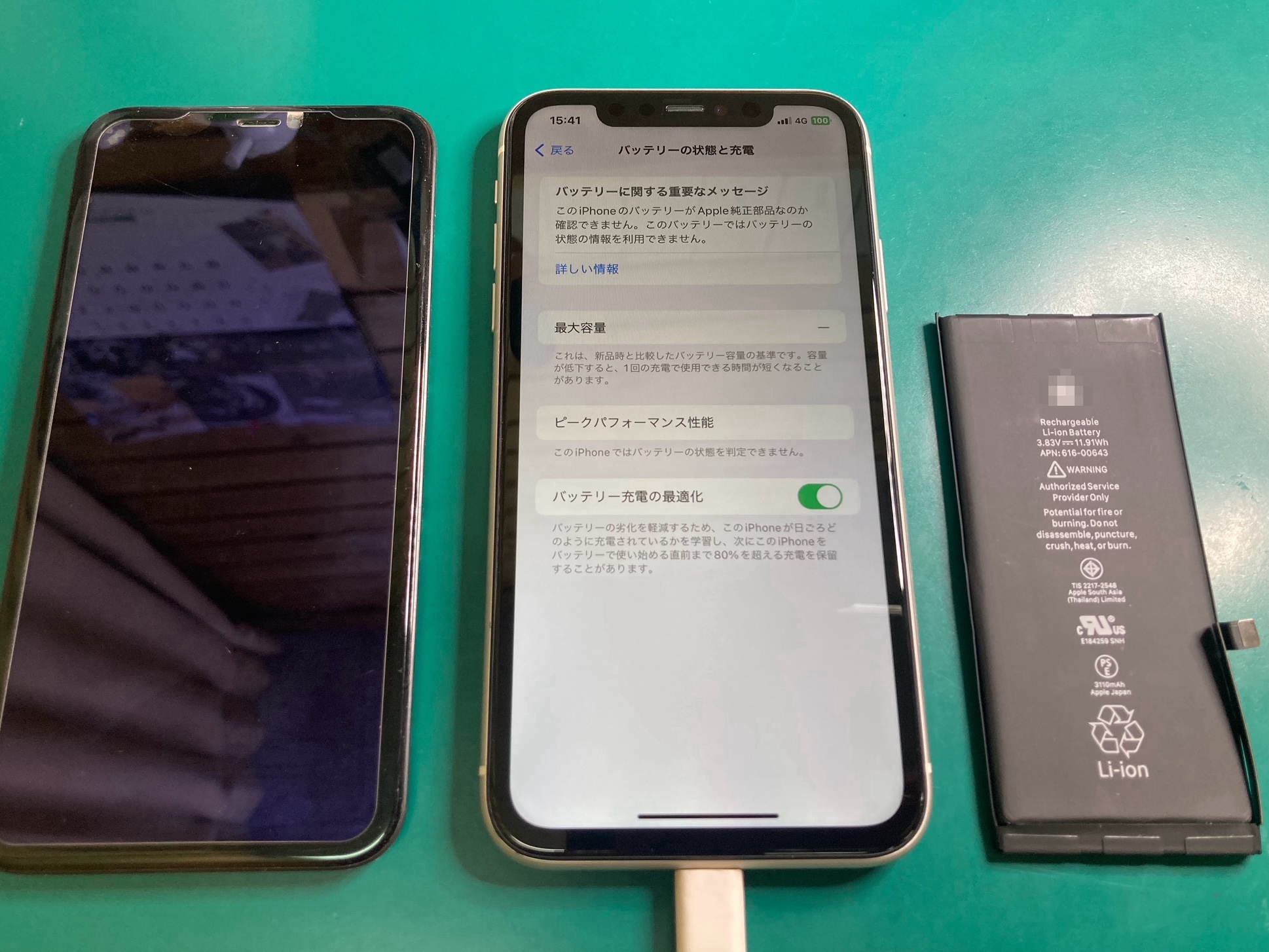 iPhoneバッテリーの膨張が原因で、液晶ディスプレイに黒線と圧迫痕が