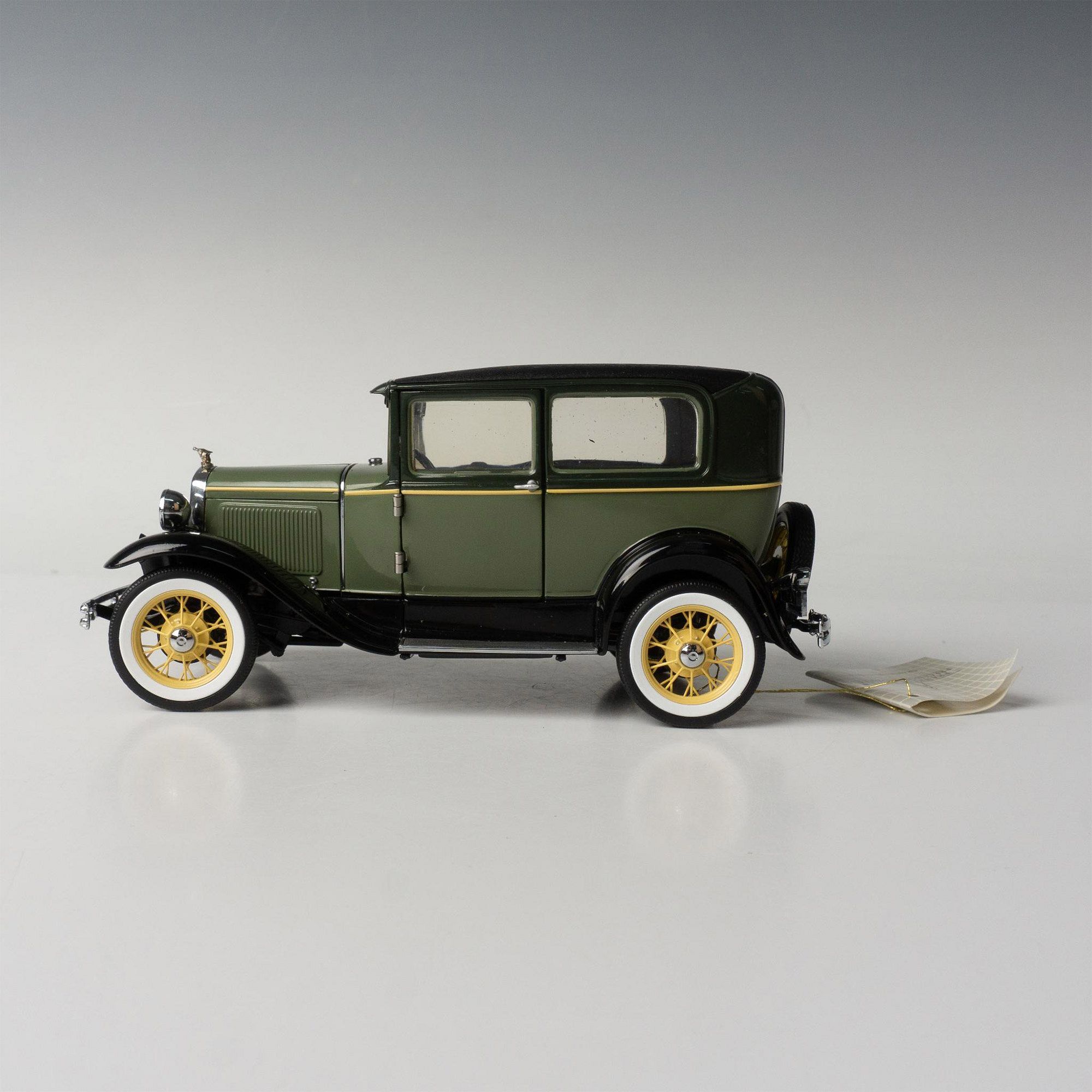 Franklin Mint 1930 Ford Model A Tudor Model Car sold at auction on