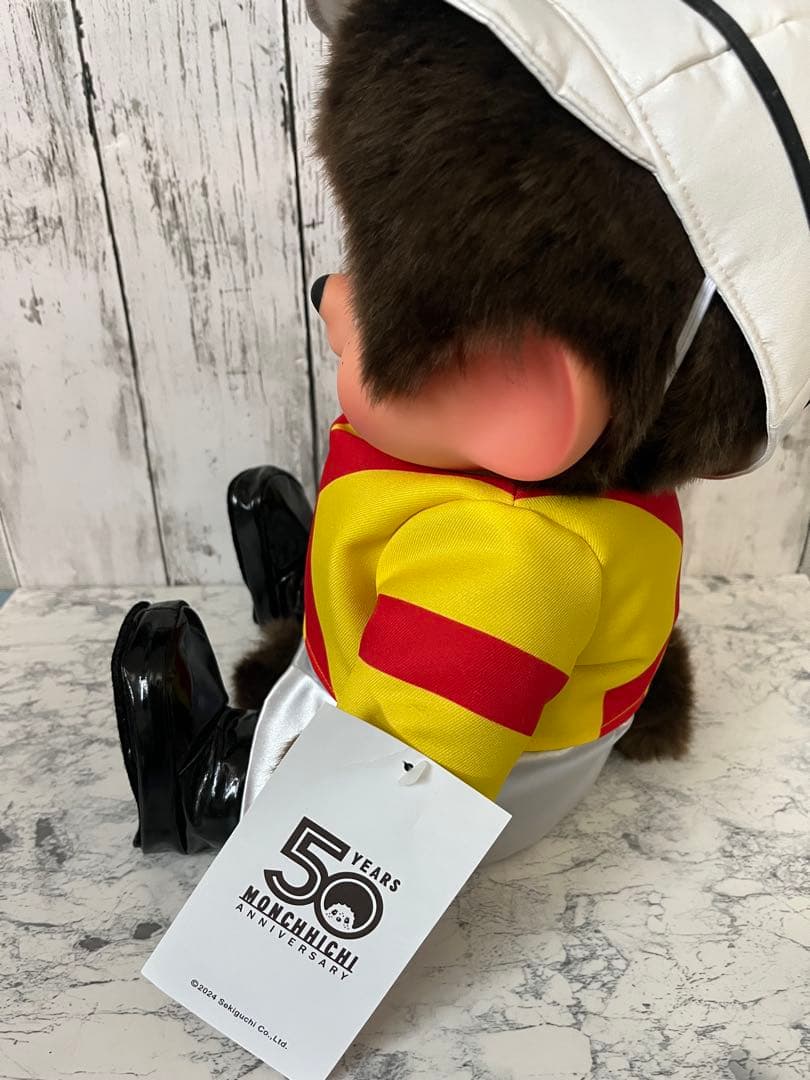 JRA【非売品】 ジャスティンパレス勝負服モンチッチ ジョッキー ぬいぐるみ