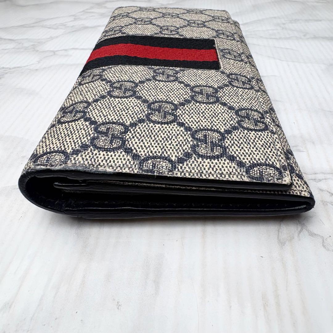 09 GUCCI 長財布 二つ折り財布 PVC GGスプリーム シェリーライン