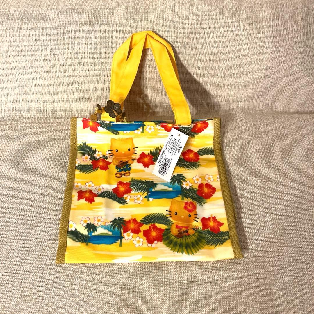 激レア‼️日焼けキティハワイアンバッグ 新品未使用品、ハイビスカスチャーム付き 日焼けのキティちゃん