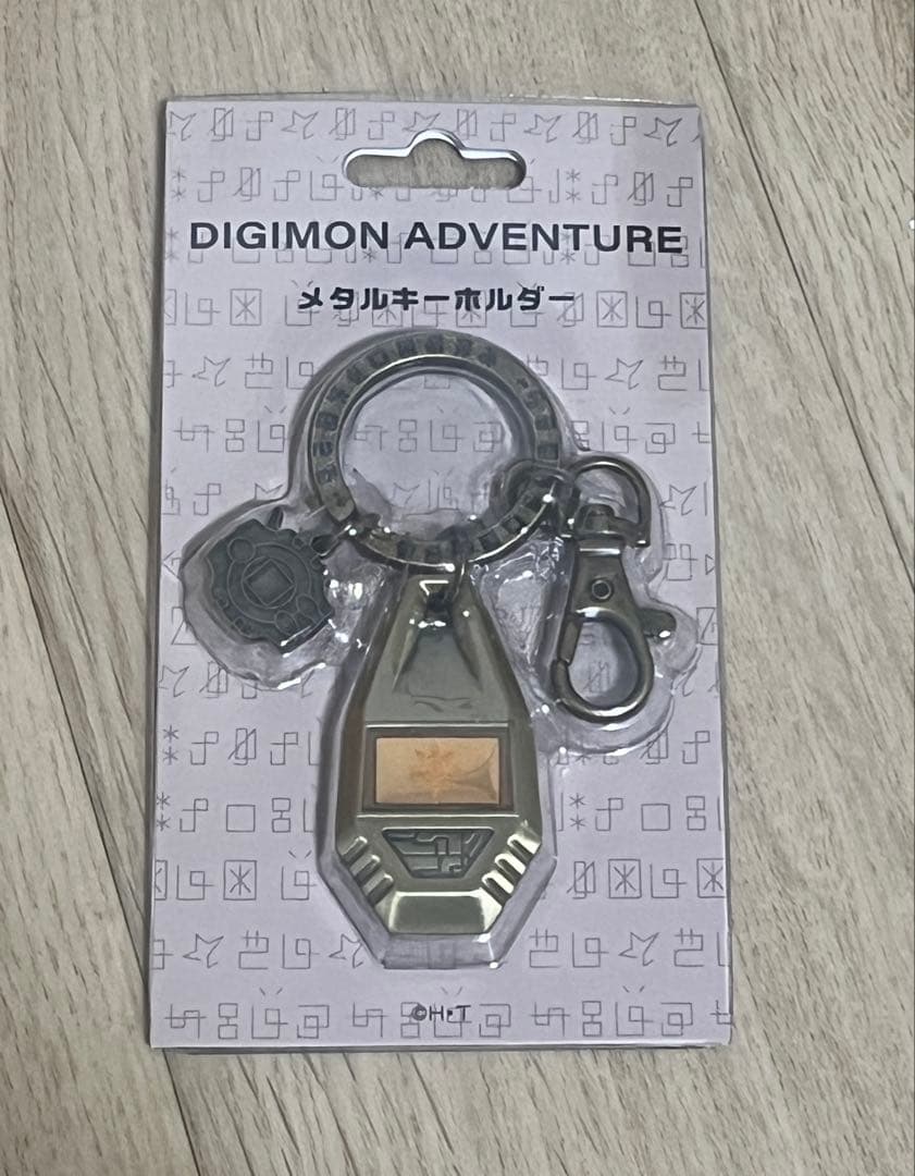 デジモン メタルキーホルダー 紋章 勇気の紋章 - メルカリ